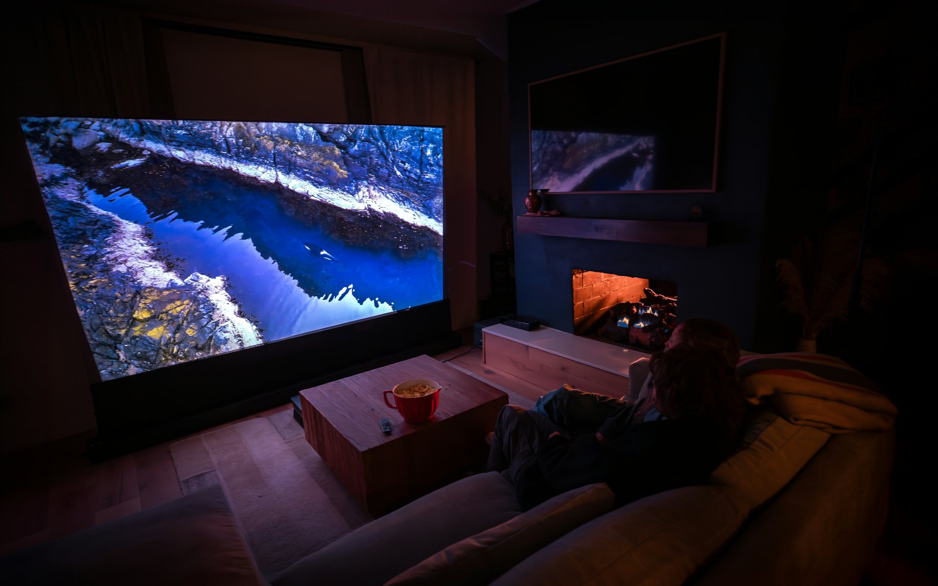 Cinematic home theater playing a FalconIPTV stream on a big screen