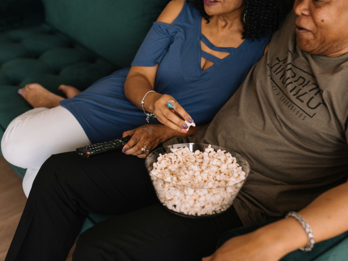 A couple choosing a movie to watch on FalconIPTV